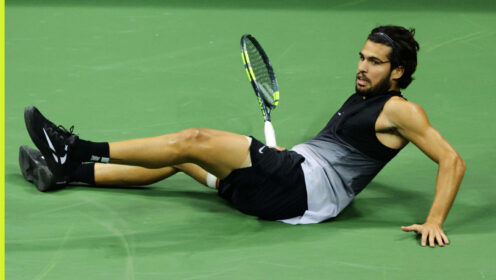 Pictured: Carlos Alcaraz takes a tumble during his match