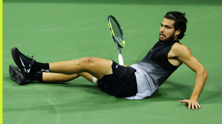 Pictured: Carlos Alcaraz takes a tumble during his match