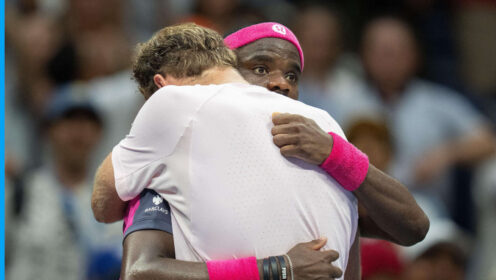 Pictured: Frances Tiafoe and Alex Michelsen hug after their match