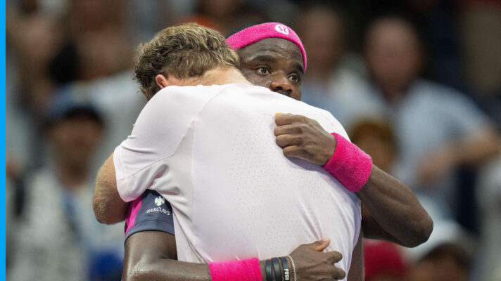 Pictured: Frances Tiafoe and Alex Michelsen hug after their match