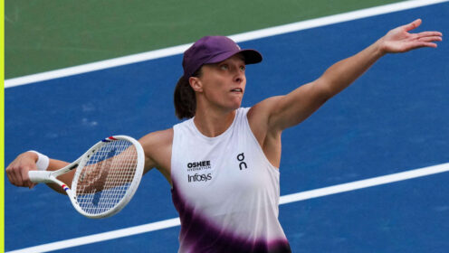 Pictured: Iga Swiatek serves during her match