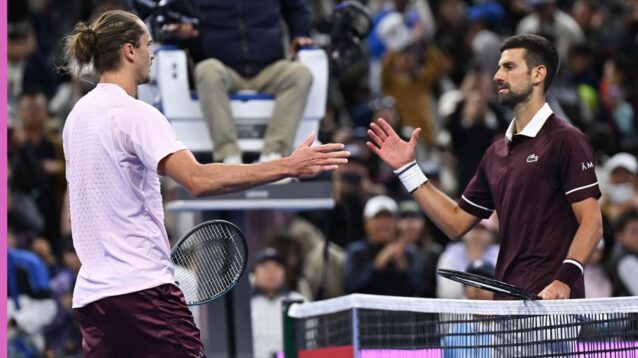 Pictured: Alexander Zverev prepares to shake hands with Novak Djokovic