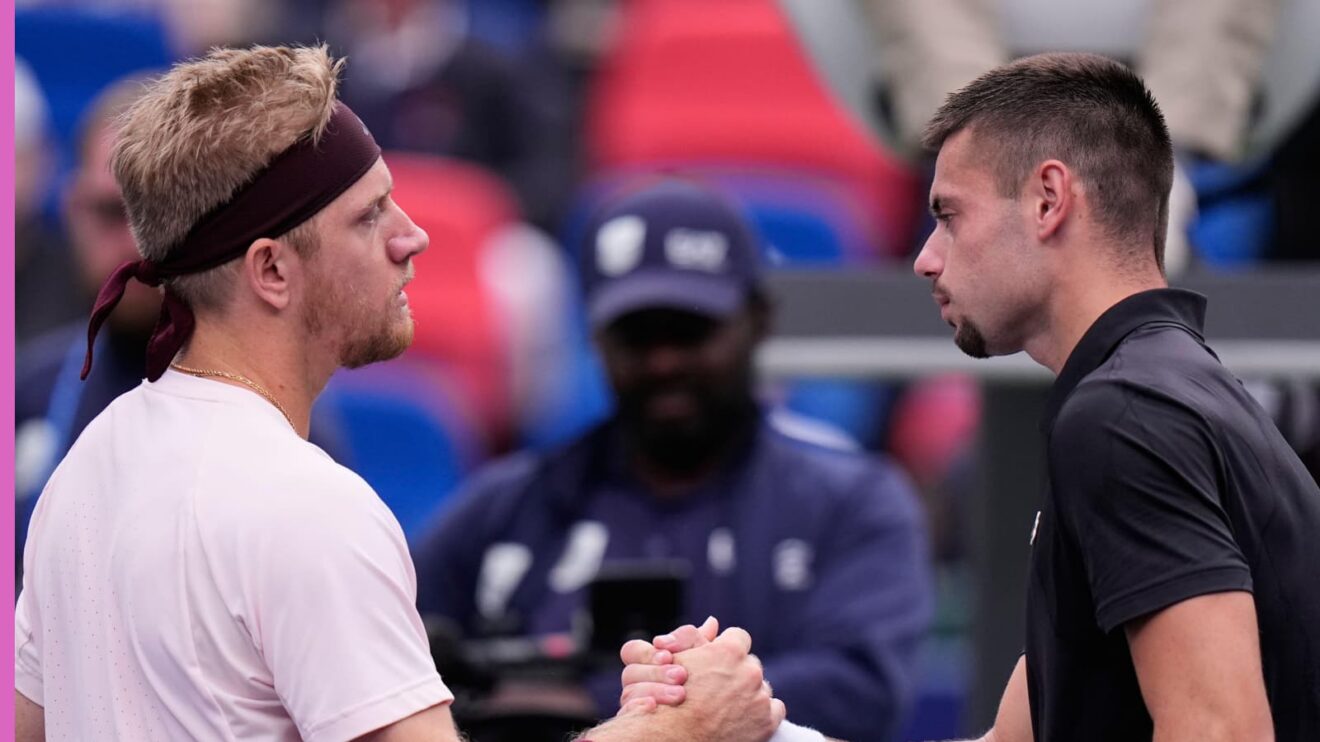 Pictured: Alejandro Davidovich Fokina shakes hands with the injured Arthur Gea