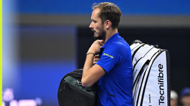 Pictured: Daniil Medvedev leaves the court after his disqualification