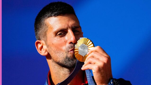 Pictured: Novak Djokovic kisses his Olympic Gold medal